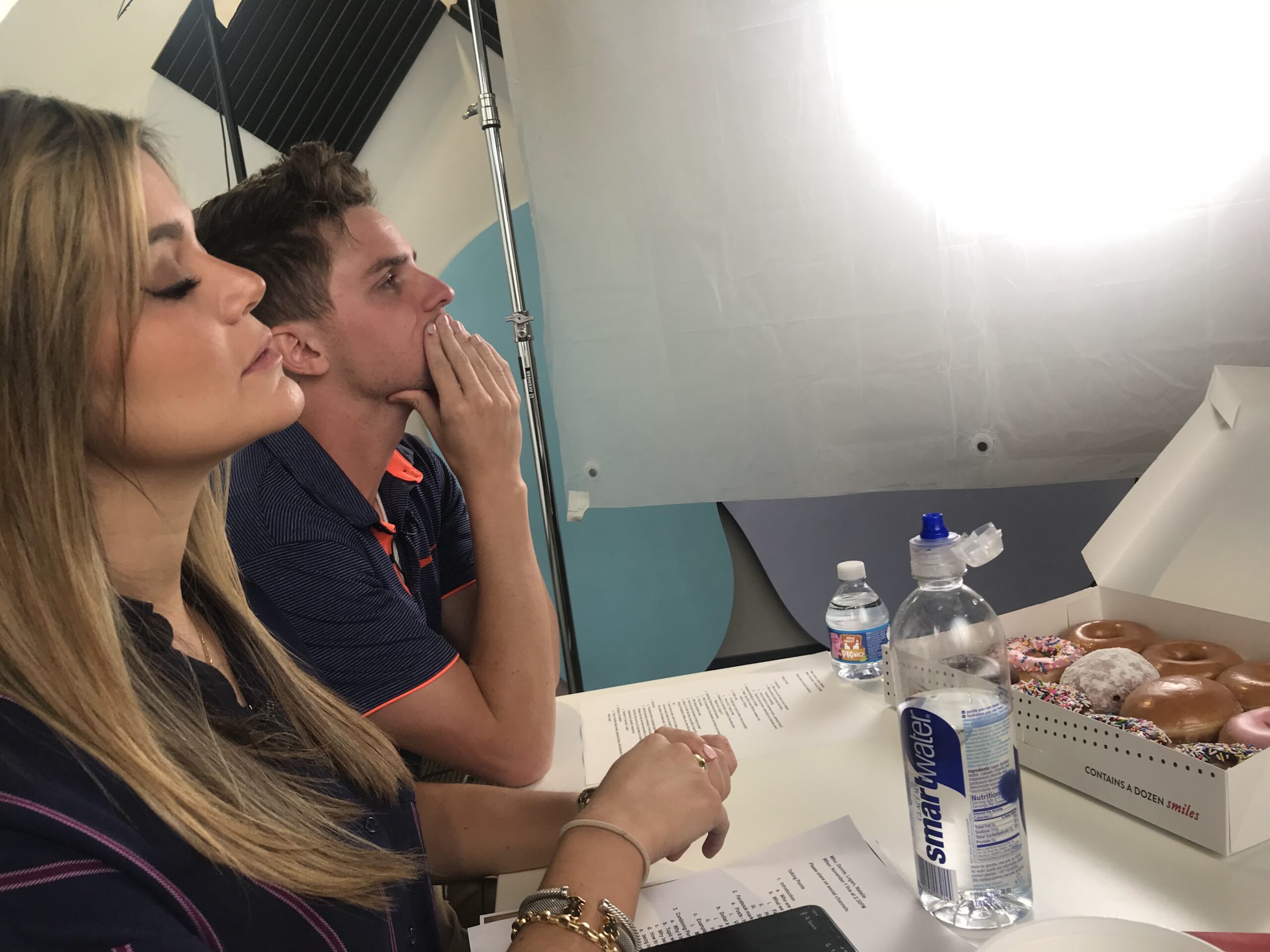 At the studio table